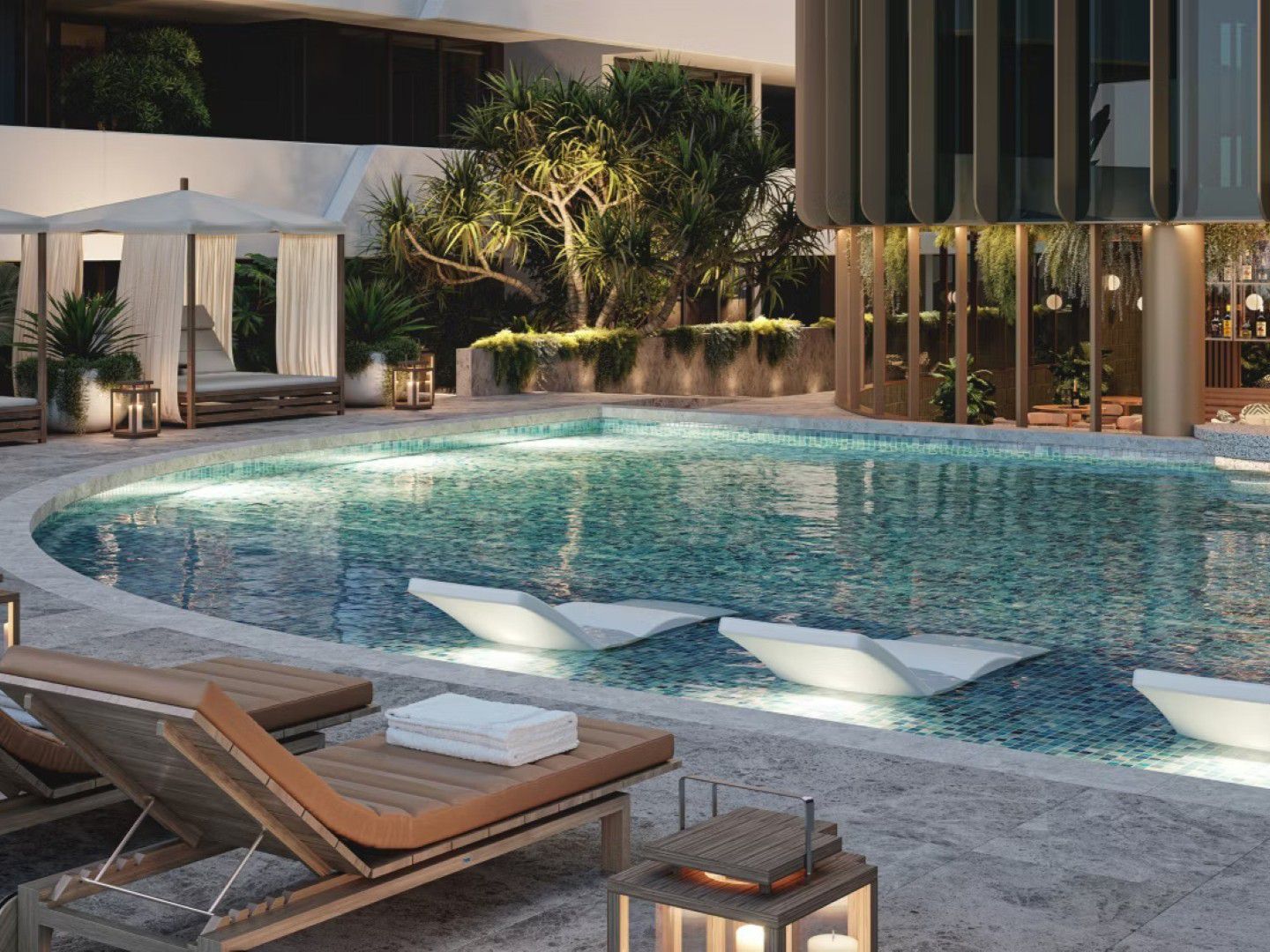 The swimming pool and submerged sunbeds at voco Gosford.